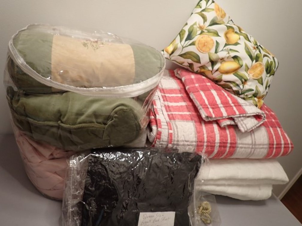 Various Bedding and Decorative Pillows
