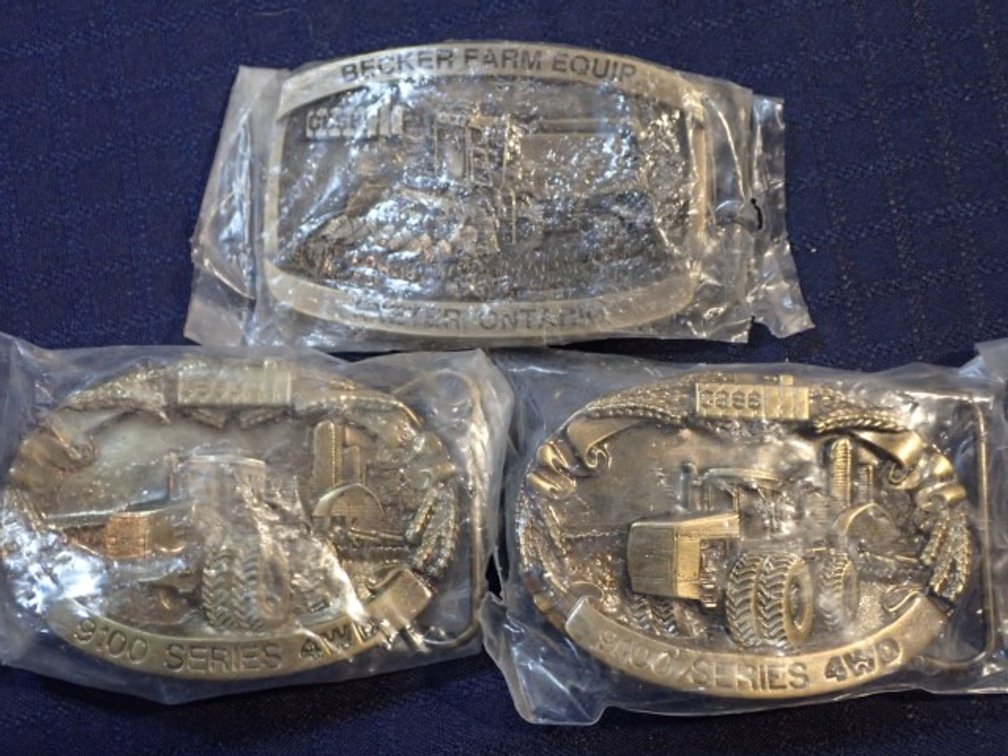 Three Tractor Belt Buckles