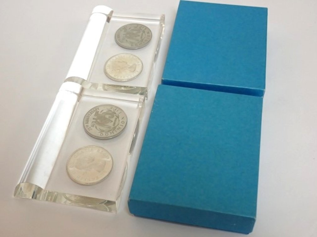 Silver Centennial Dollars and Commemorative Service Sets