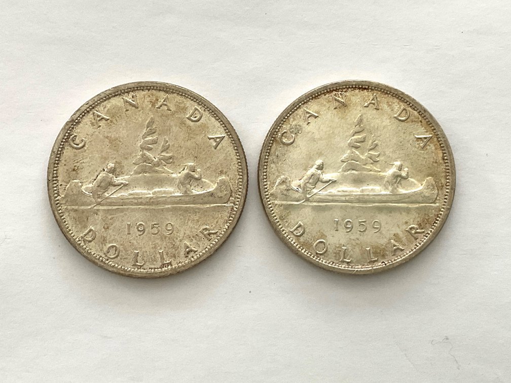 Two 1959 Silver Dollars Canadian
