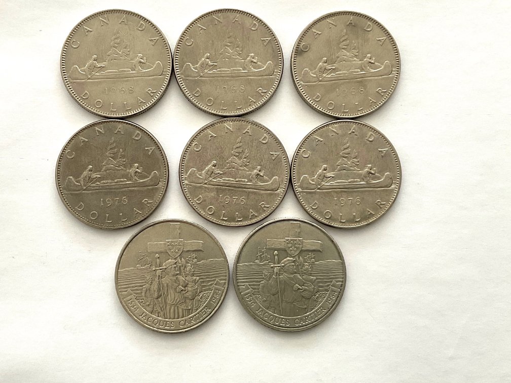 Eight Vintage Canadian Dollar Coins