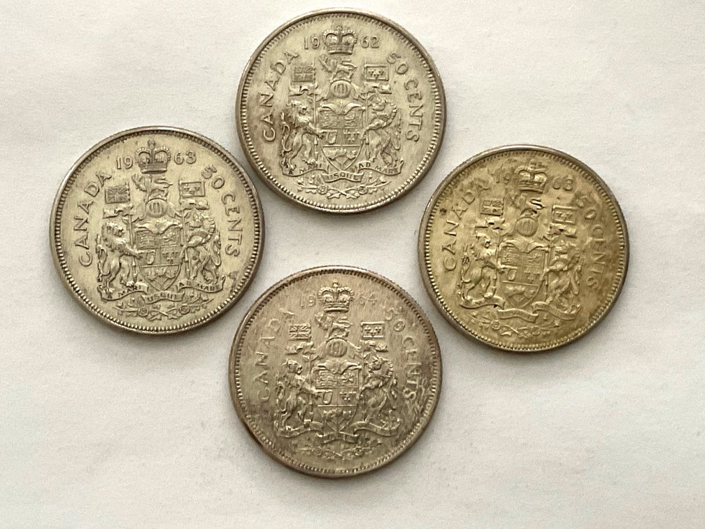 Four Silver Half Dollar Coins