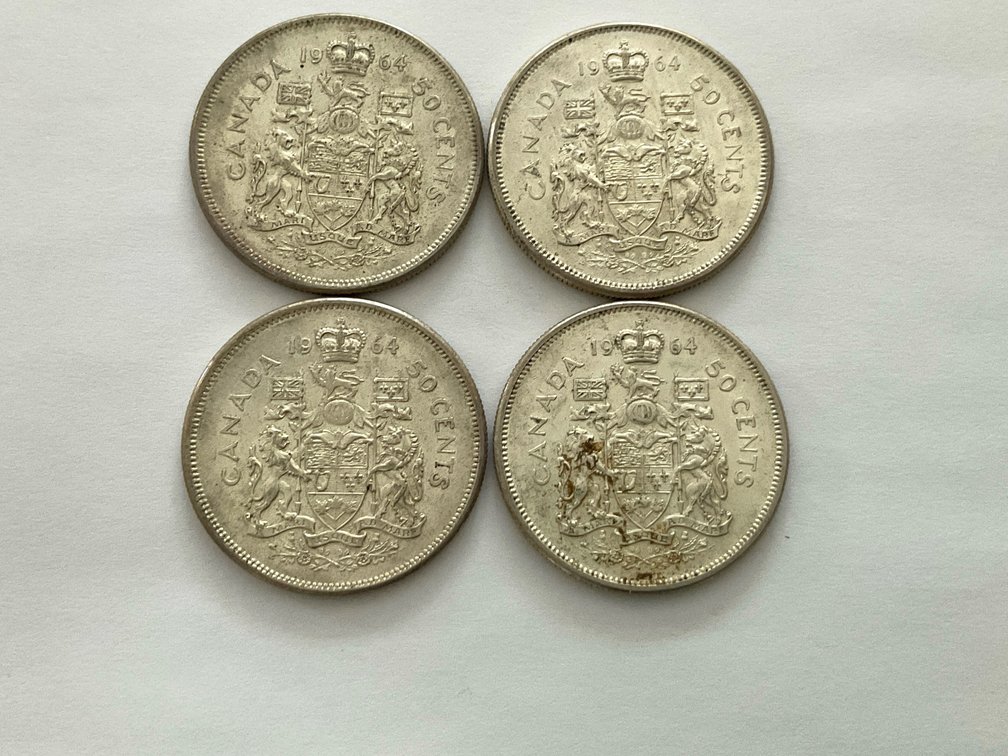 Four 1964 Silver Half Dollar Coins