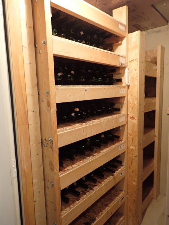 Five Shelves of Bottles