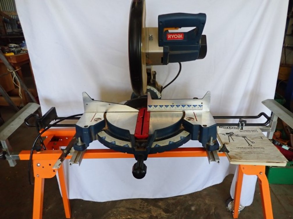 Miter Saw including stand