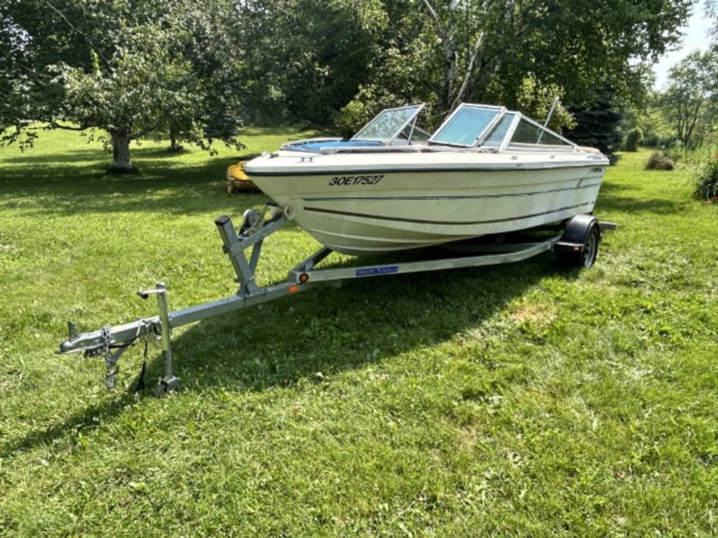 3500 Galvanized Trailer with project boat VIN # 1ZEAAHGA1YA011896