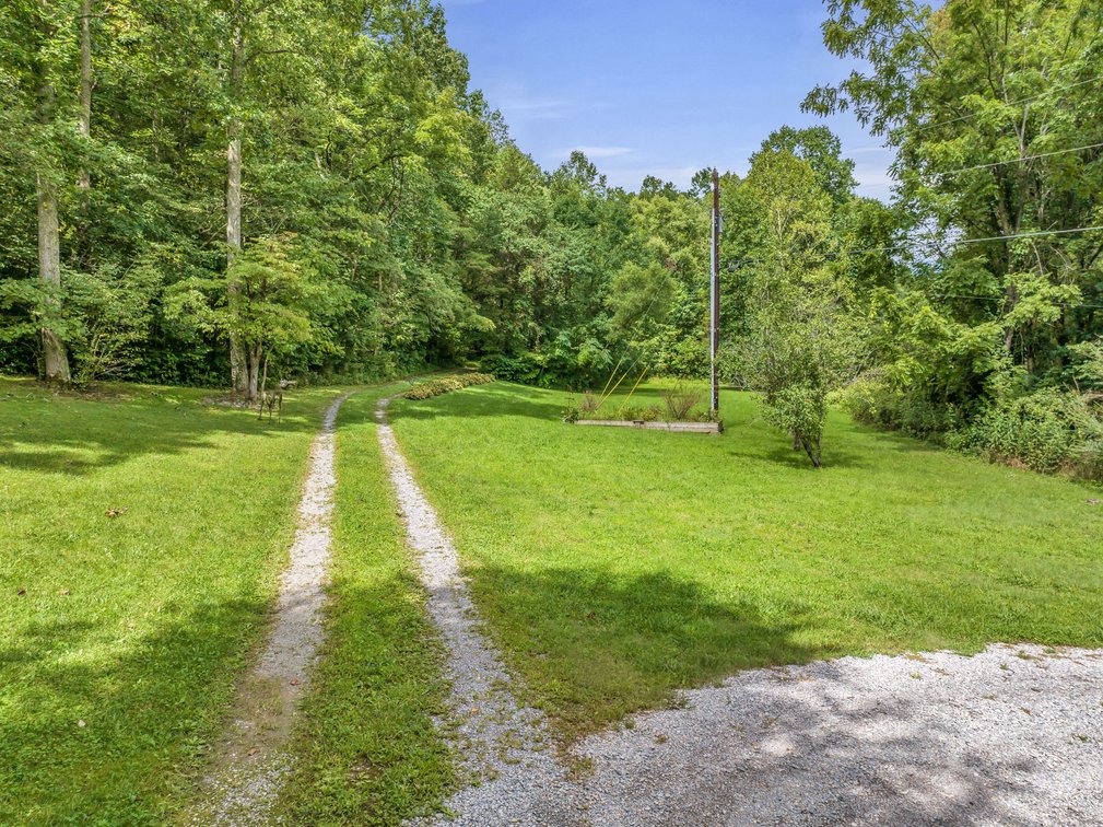 Image for Caney Fork Creek - 22 acres of Amazing Nature + Comfortable Old Log Cabin + Guest House + Shop
