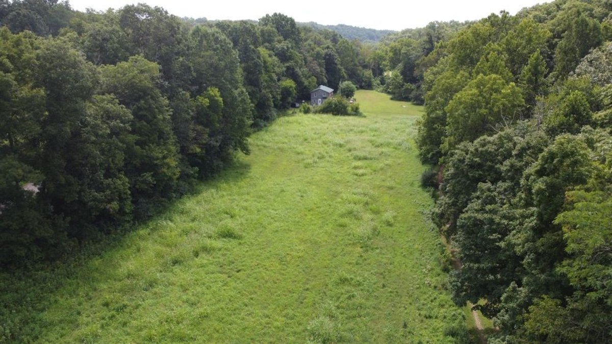 Image for Creekside Retreat on 5.99 beautiful acres along Hassell Creek in Hickman County - 1,000 feet of Creek Frontage - only $249,900
