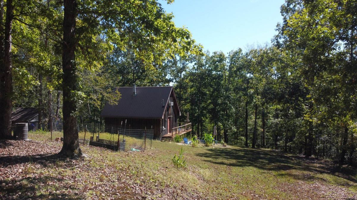 Image for Cabin & Lake - 44.5 acres on Hwy 50 in Hickman County - Joins 800-acre WMA!