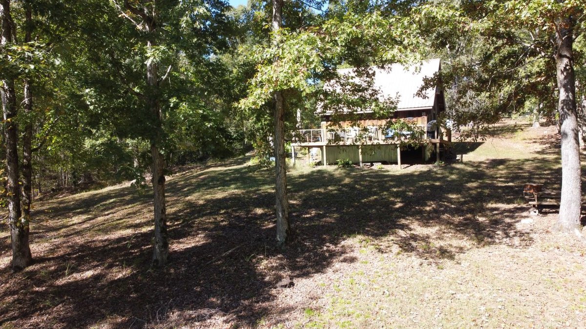 Image for Cabin & Lake - 44.5 acres on Hwy 50 in Hickman County - Joins 800-acre WMA!