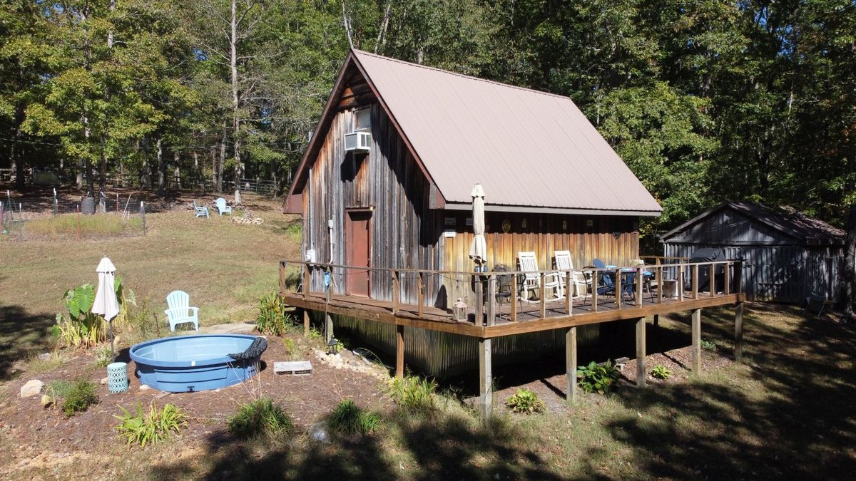Image for Cabin & Lake - 44.5 acres on Hwy 50 in Hickman County - Joins 800-acre WMA!