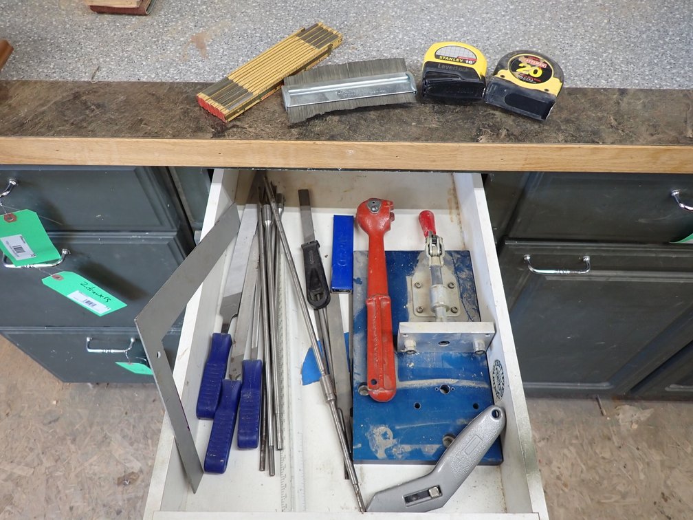 Files, rasps, tape measures, specialty clamps, mason's ruler