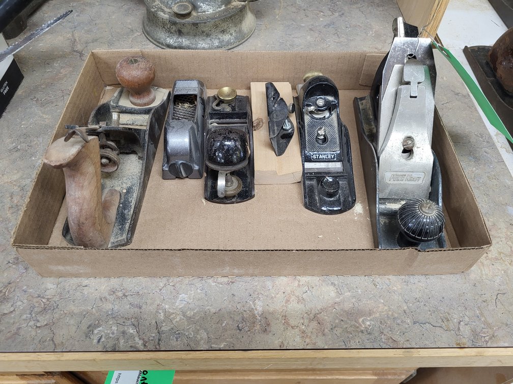 Assorted wood planes as shown