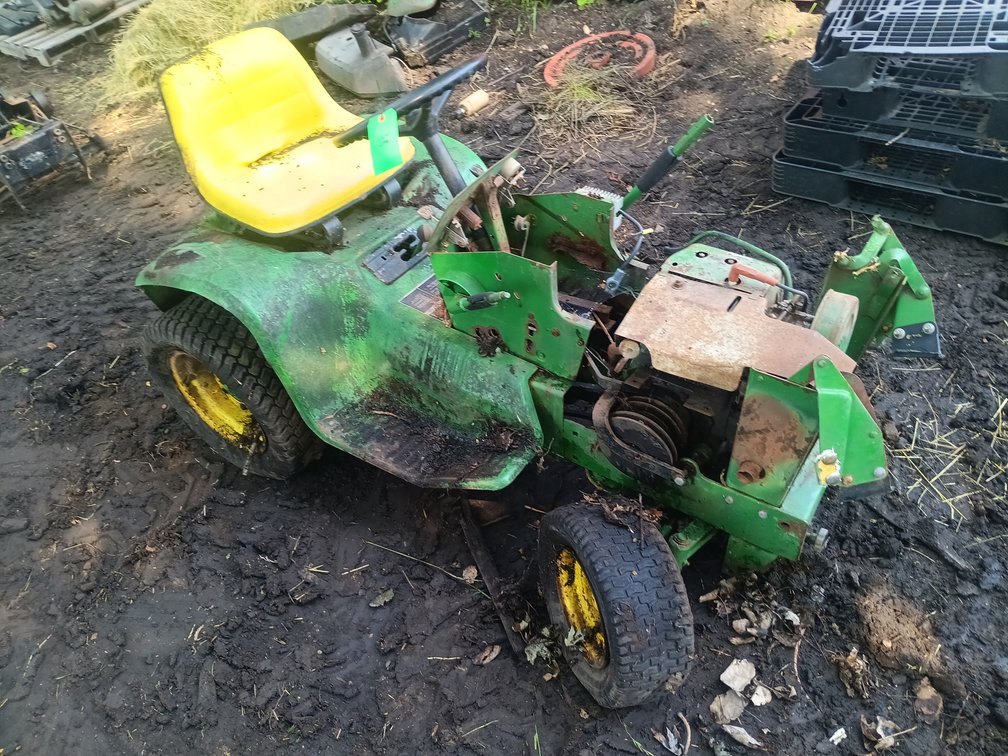 John Deere 110 or 112 with chains