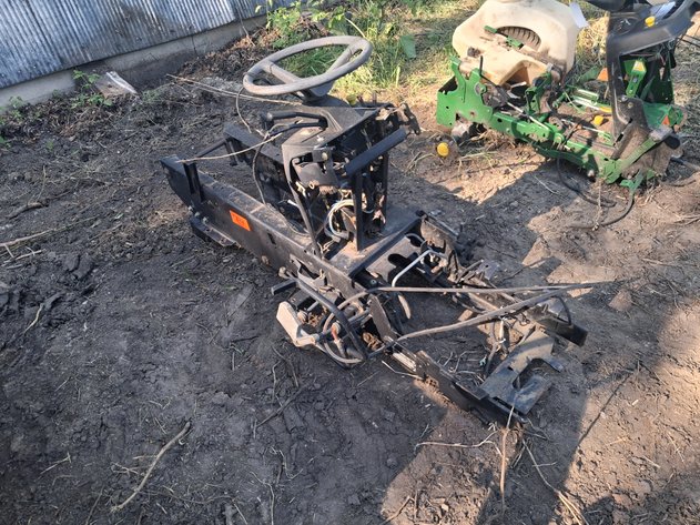 Image for John Deere 425/445 frame with a few parts on it yet