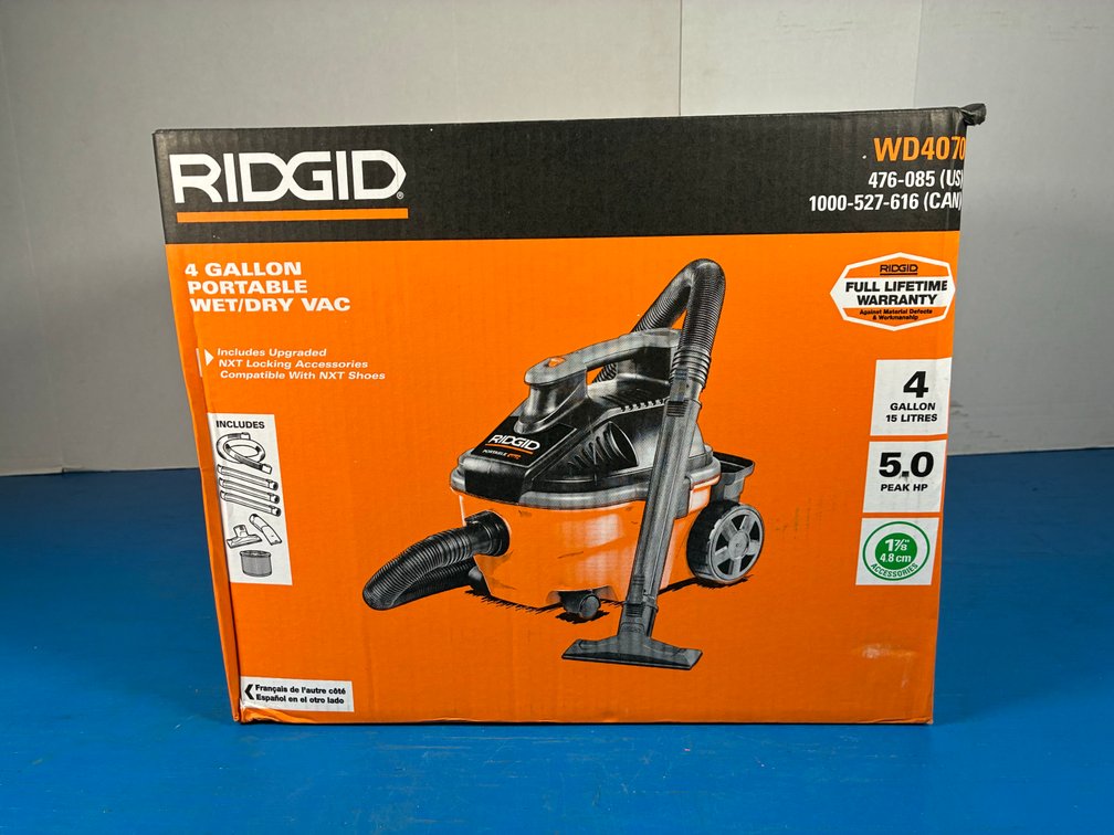 Ridgid 4 Gal. 5.0 Peak HP Portable Shop Vacuum Wet Dry Vac with Fine Dust Filter, Locking Hose and Attachments WD4070
