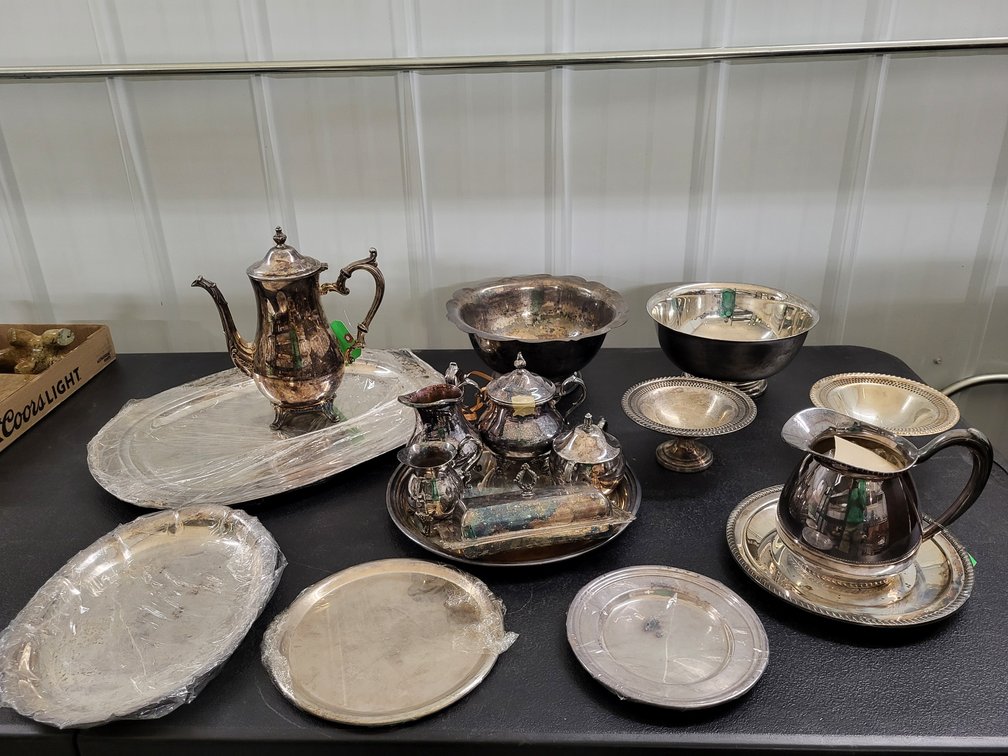 Assorted silver plate holloware including salvers, bowls, bread baskets