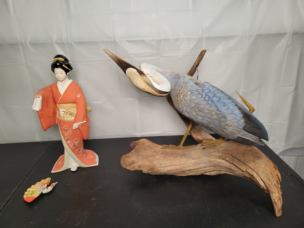 Porcelain and wood figurine