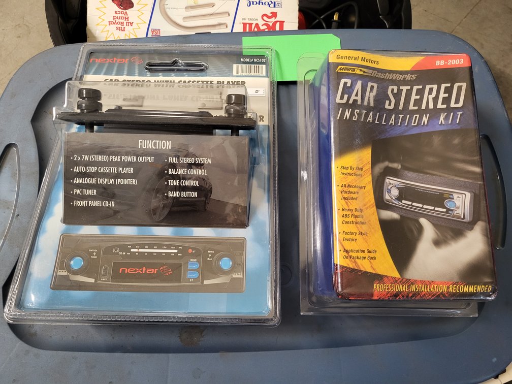 Nextar car stereo with cassette player and a GM installation kit