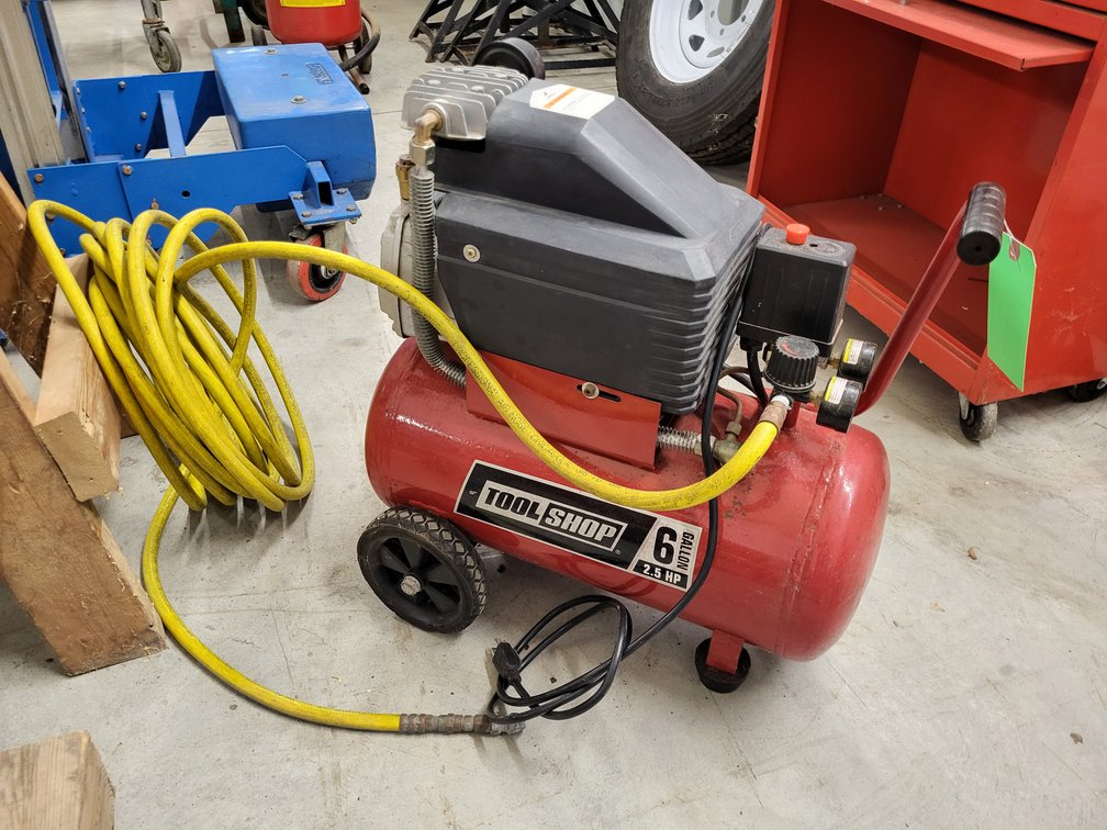 Tool Shop portable air compressor with hose