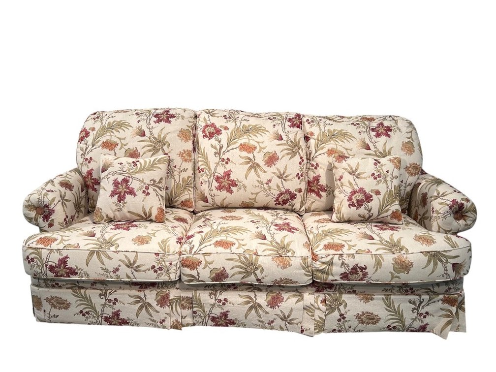 $3,000 New Floral Pattern Upholstered Three-Seat Sofa with Rolled Arms and Skirted Base