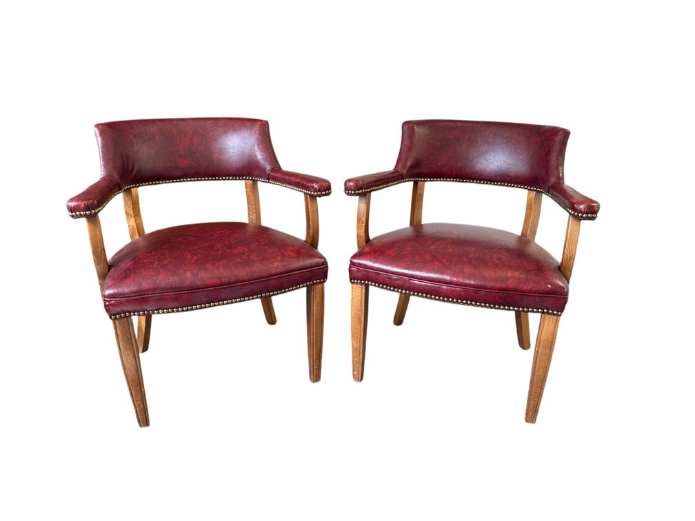 Pair of upholstered barrel back armchairs, 24 x 19 x 28”