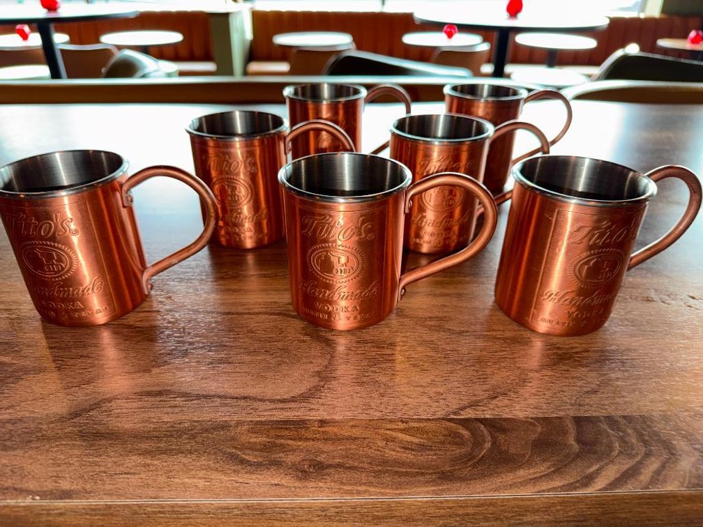 Lot of 7, Tito's Vodka Embossed Moscow Mule Mugs