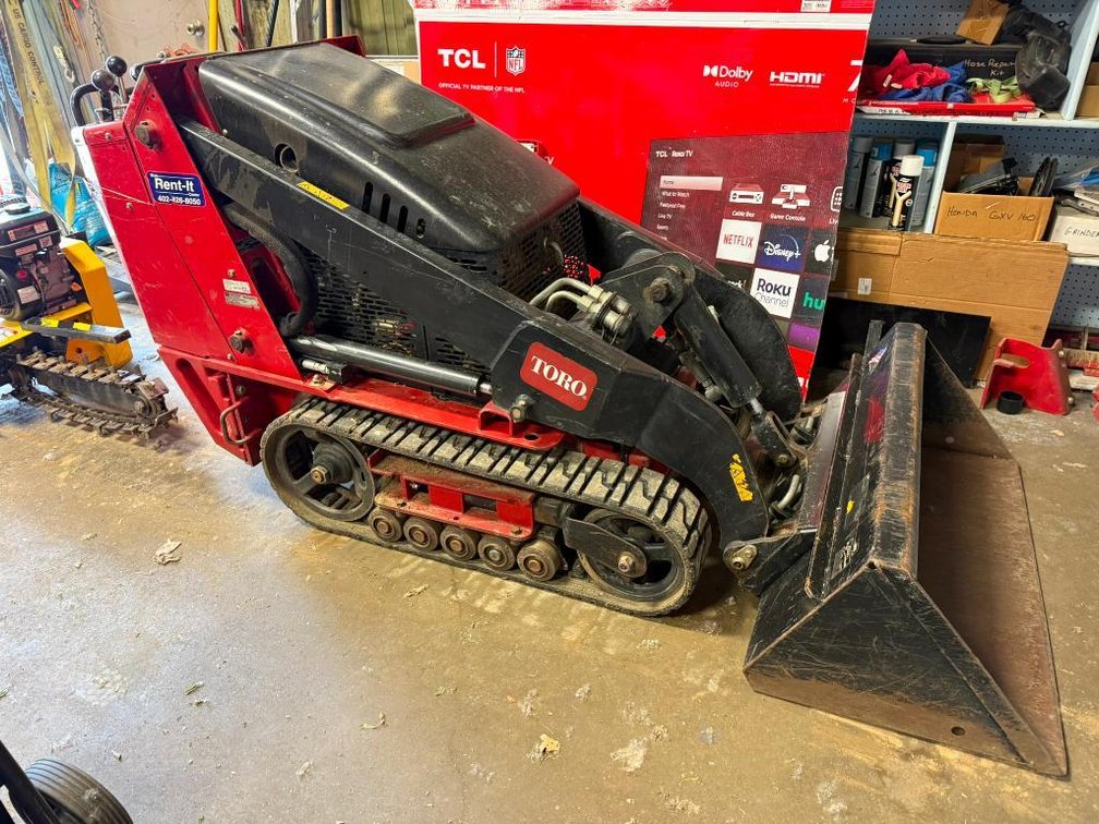 Toro Dingo Compact Utility Loader: Mini Skid Steer, Track Loader w/ 2 Buckets (42in, 34in), Trencher, & Forks