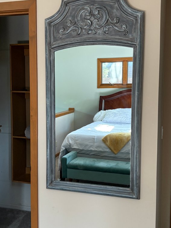 Wall-Mounted Mirror in Ornate Frame