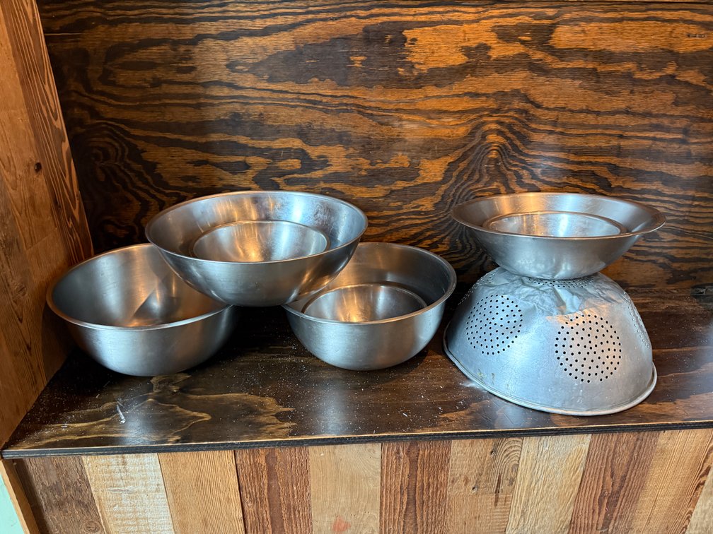 7 Stainless Steel Mixing Bowls and One Large Colander, All for One Bid