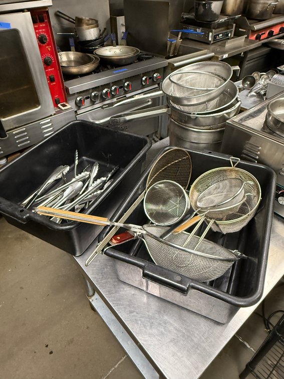 Two Bus Tubs w/ Contents; Strainers, Colanders, Tongs