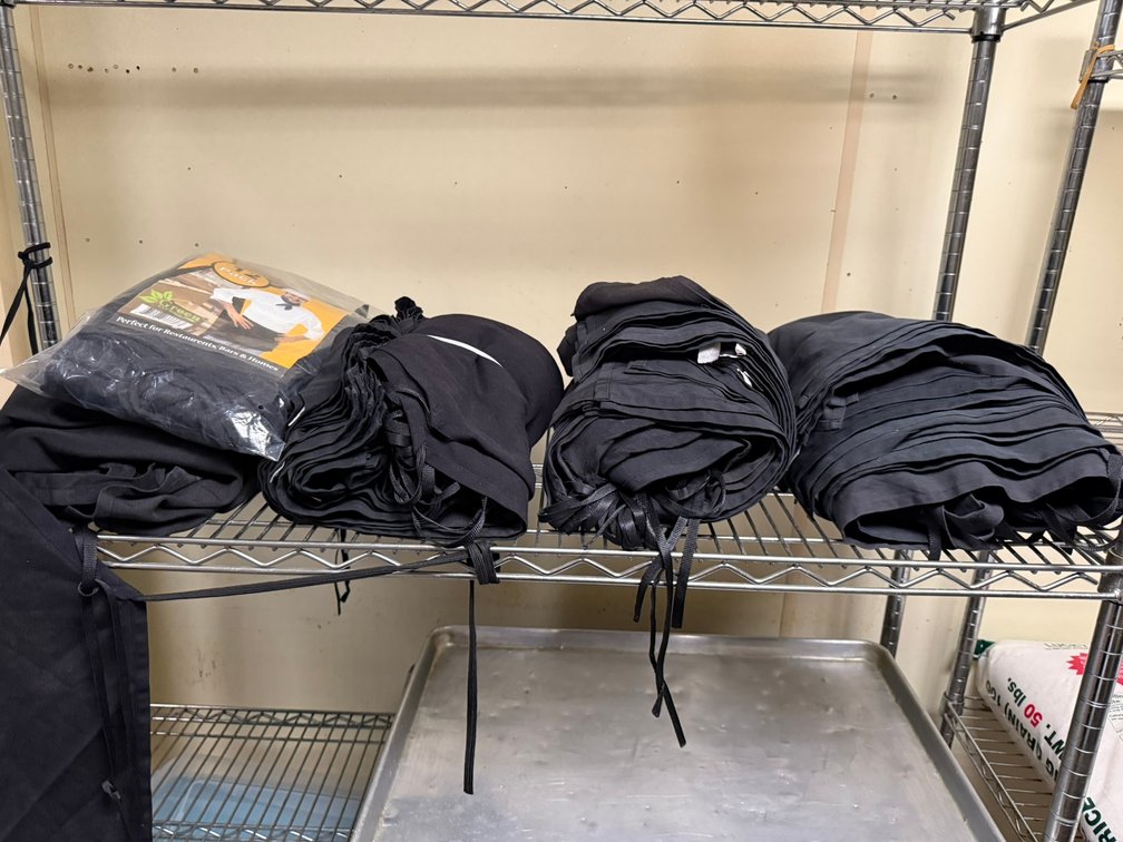 Group of Black Aprons