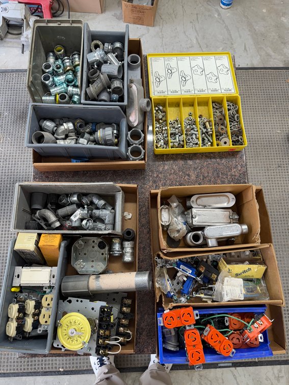 Four Boxes of Electrical Supply & Hardware; Connectors & Couplers, Timers, Power Outlets, Switches