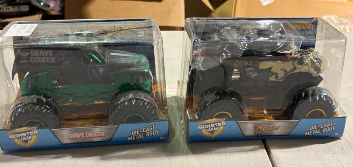 Lot of 2, Hot Wheels Monster Jam Grave Digger  & Pirate's Curse Die-Cast Metal Body Trucks