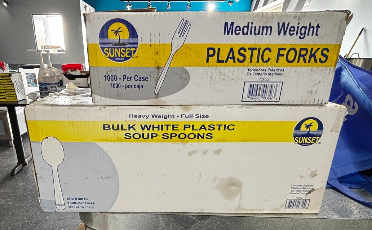 Boxes of Sunset Plastic Forks and Soup Spoons