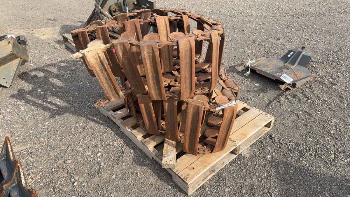 SET OF STEEL SKID STEER TRACKS