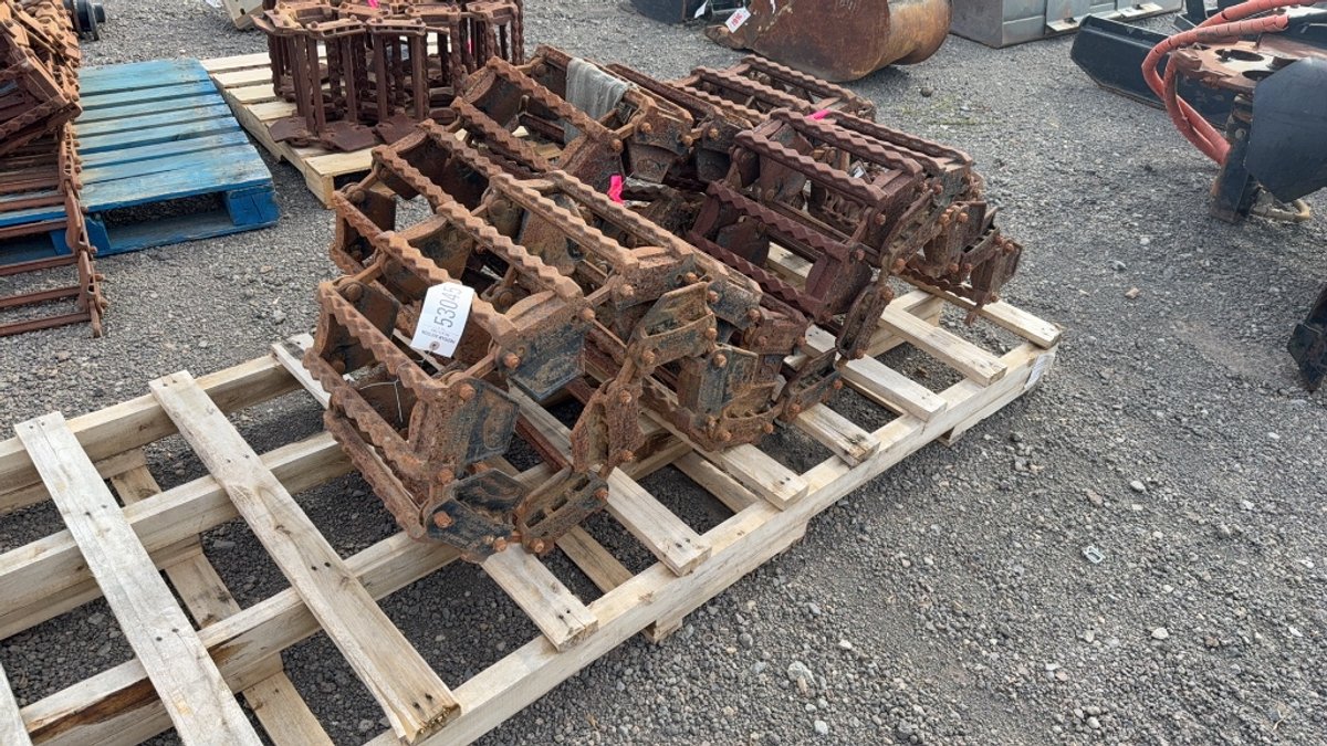 SET OF MCLAREN STEEL SKID STEER TRACKS
