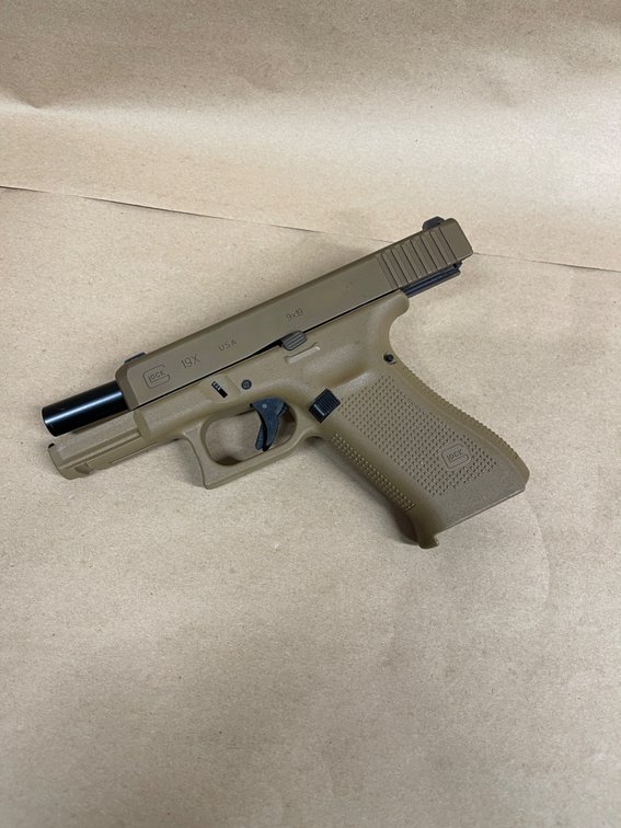 Glock 19x - 9mm, night sights, three ten round magazines, back strap replacements, light laser combo