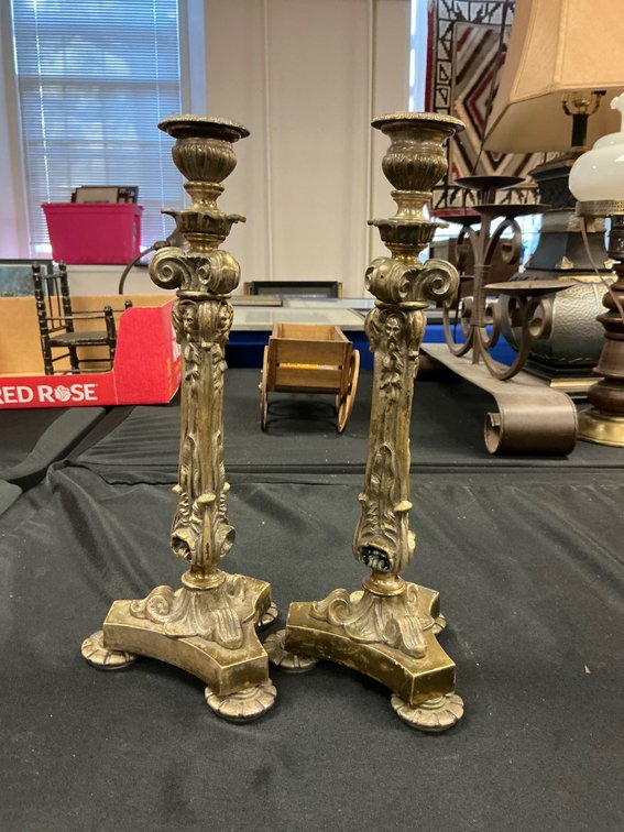 Pair of Ornate Metal Candlesticks with Decorative Design