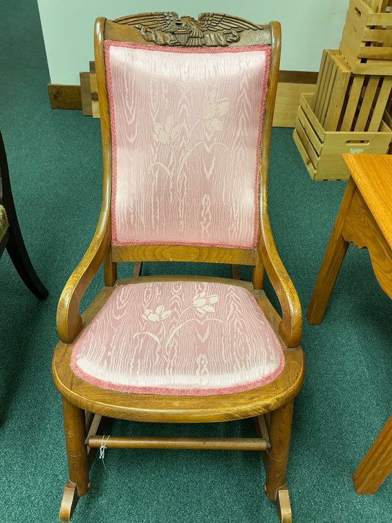 Carved Wood Rocking Chair with Pink Upholstery and Eagle Motif
