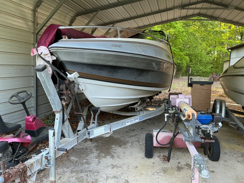 195 Sundowner Boat with Load Rite Trailer and Title
