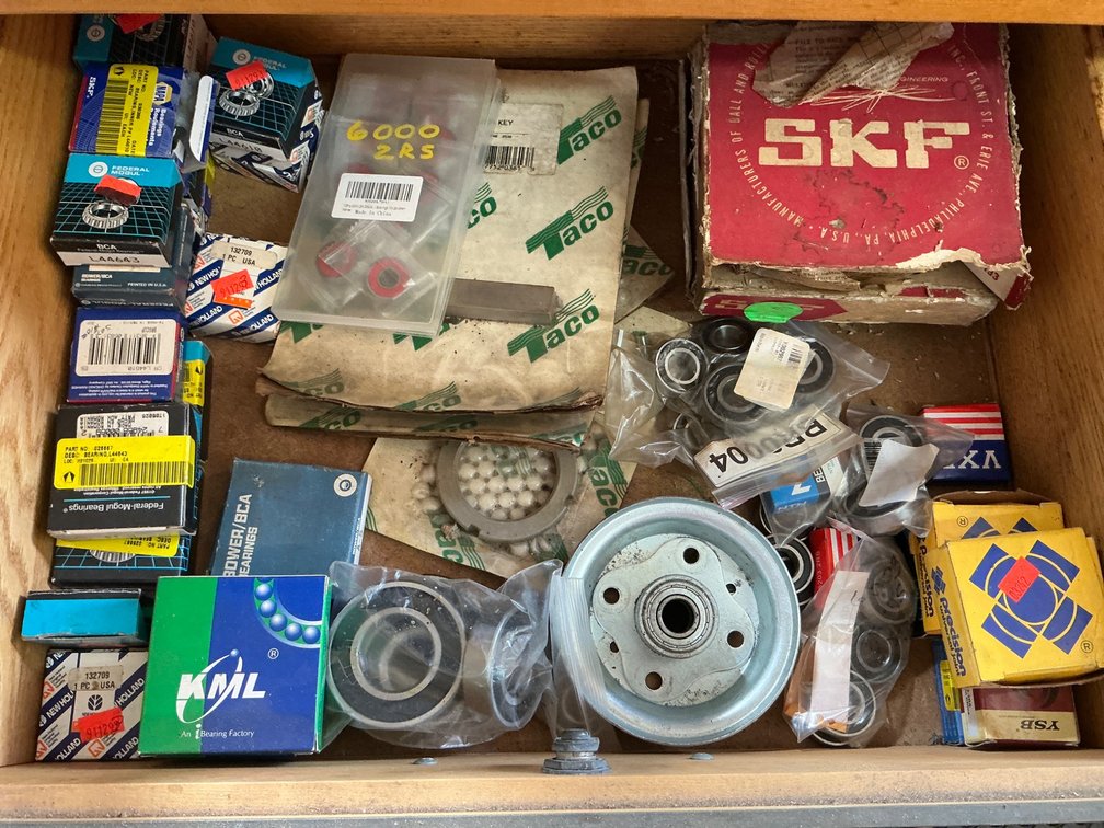 Contents of Cabinet and Drawers: Bearings, Clamps, Tools, and Components