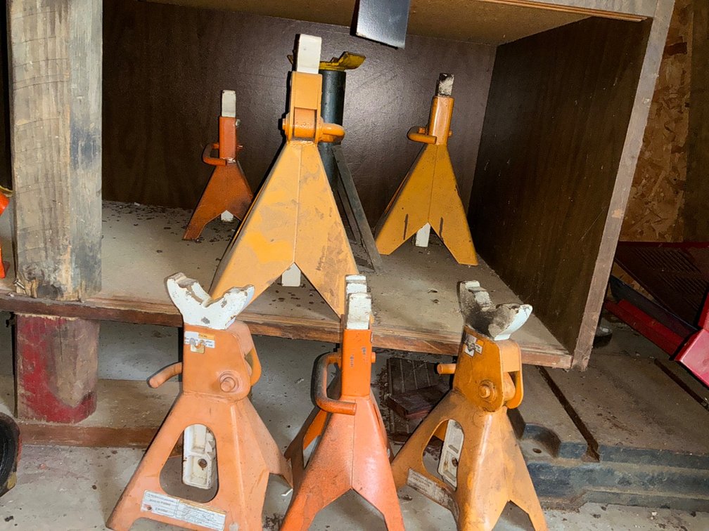 Assorted Jack Stands in a Variety of Styles and Sizes