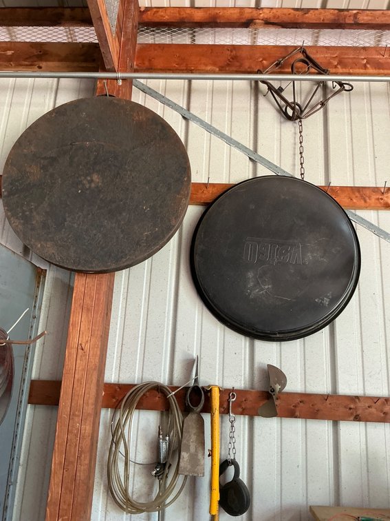 Assorted Tools and Wall-Mounted Utility Items with Chain Snare and Lids