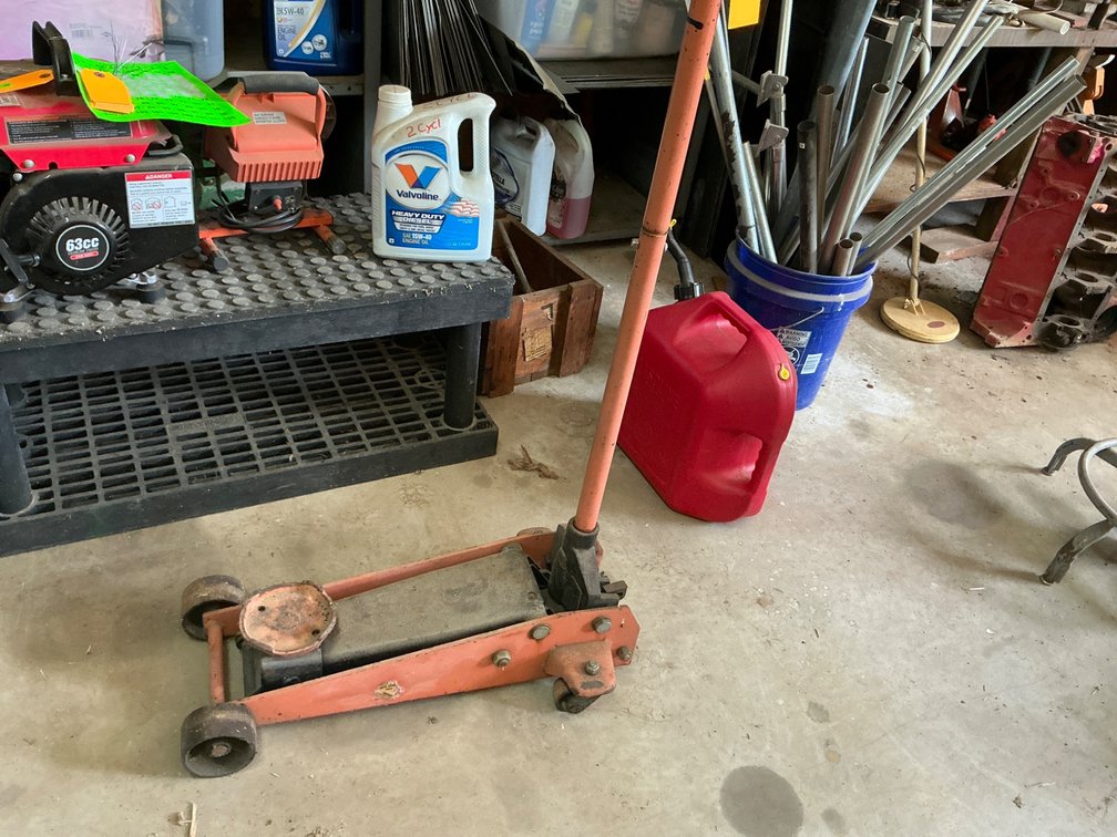 Heavy-Duty Floor Jack in Working Condition with Steel Frame