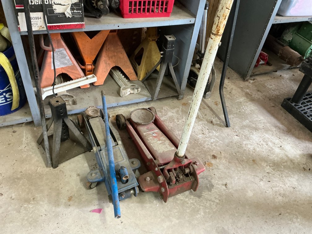 Collection of Hydraulic Floor Jacks and Heavy-Duty Jack Stands