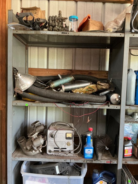 Contents of Metal Shelves With Assorted Tools and Items
