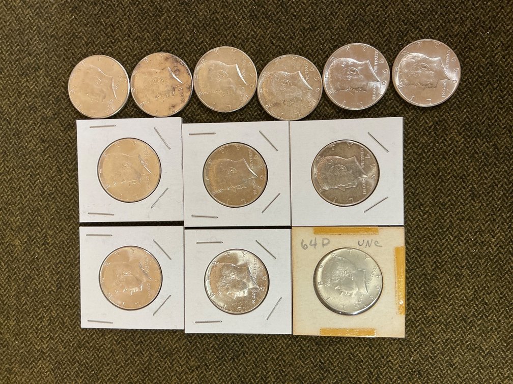 Twelve 1964 Kennedy Silver Half Dollars, BU