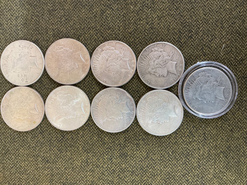 Nine Peace Silver Dollars, Circulated Condition