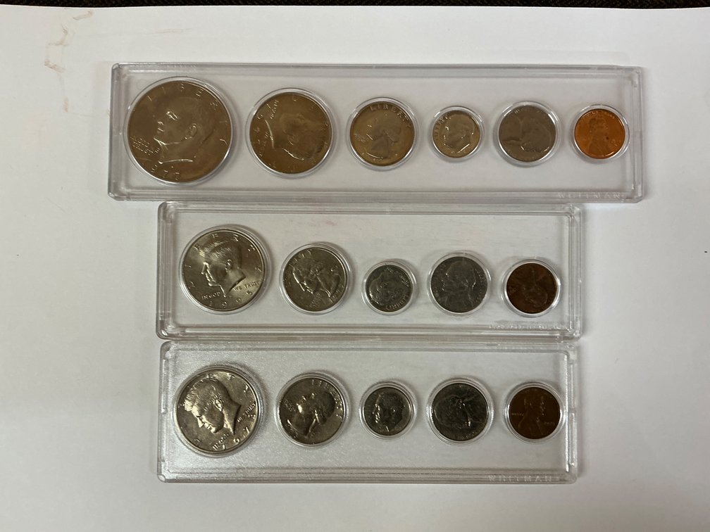 U.S. Mint Proof Sets from 1973, 1977, and 1995 in Original Holders